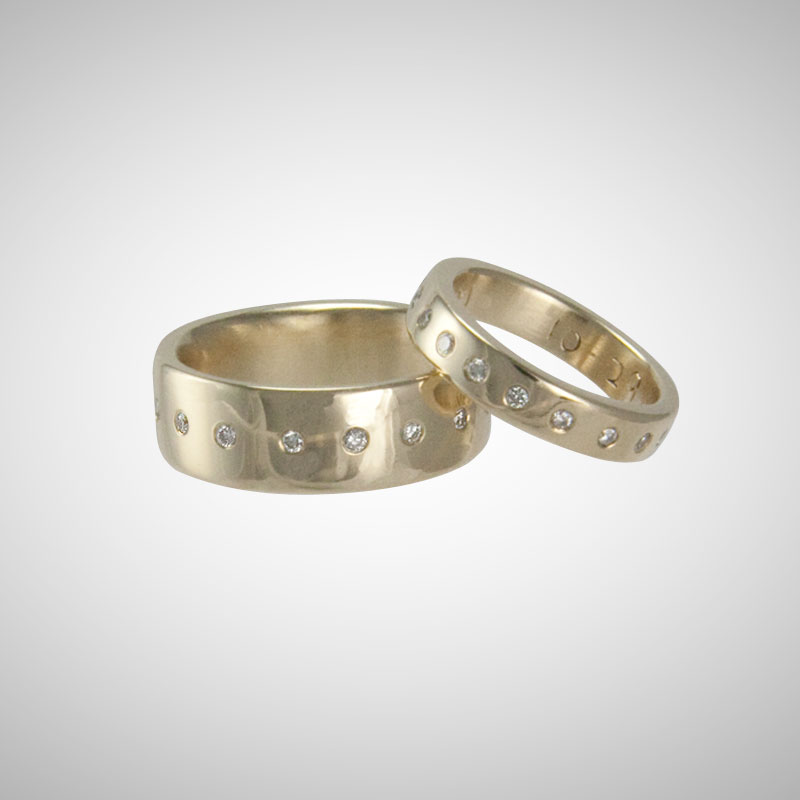 Custom Wedding Rings in Yellow Gold with White Diamonds